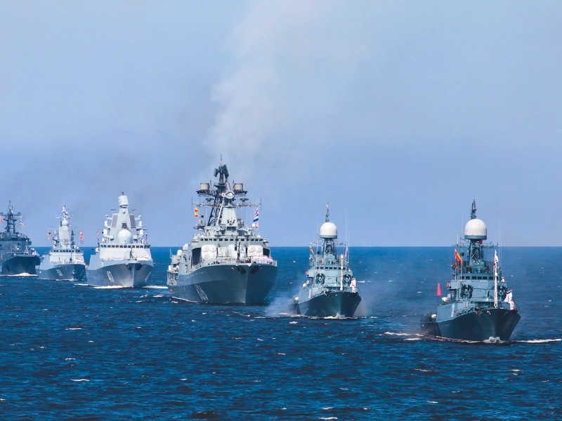 A fleet of navy vessels on the ocean